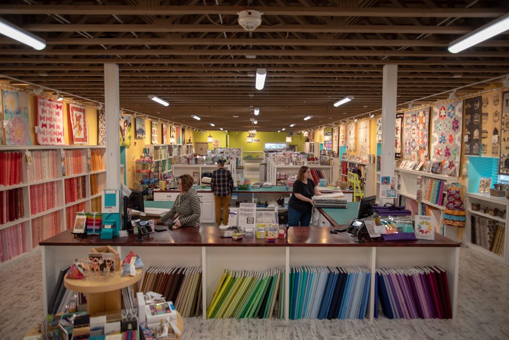 Customer browsing inside a fabric shop